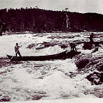 Log floaters in Skogfoss rapids.jpg